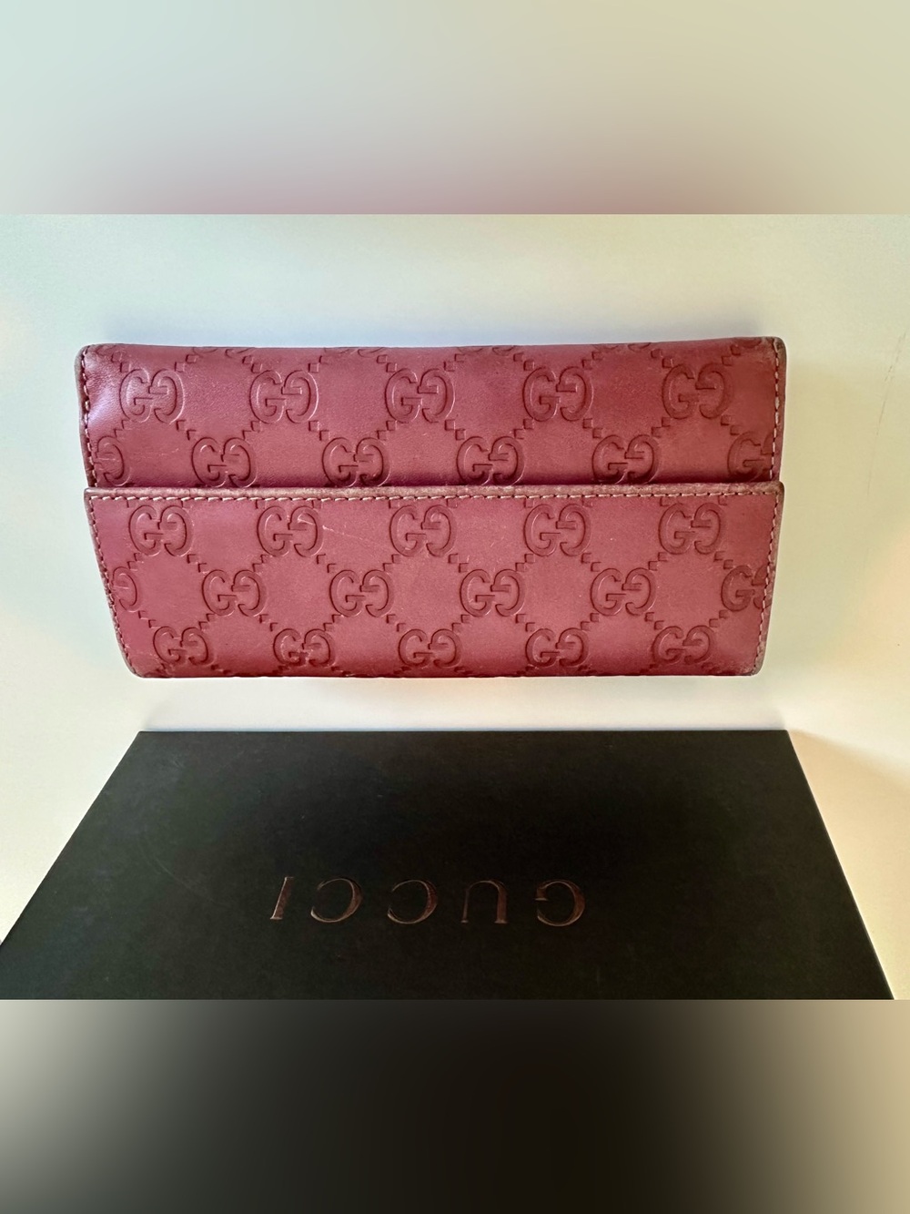 Gucci Embossed GG Leather Wallet